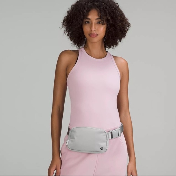 lululemon athletica Handbags - Lululemon Everywhere Silver Drop Belt Bag New NWT RARE letters on belt